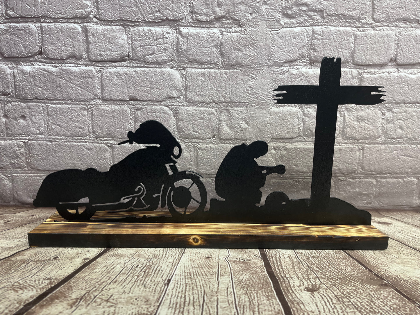 Praying Motorcyclist
